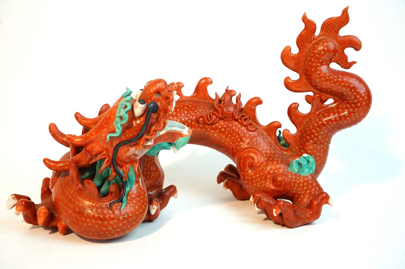A Chinese Coral Red Ground Gilt and Green Enameled Porcelain Figure of Dragon (1 of 11)