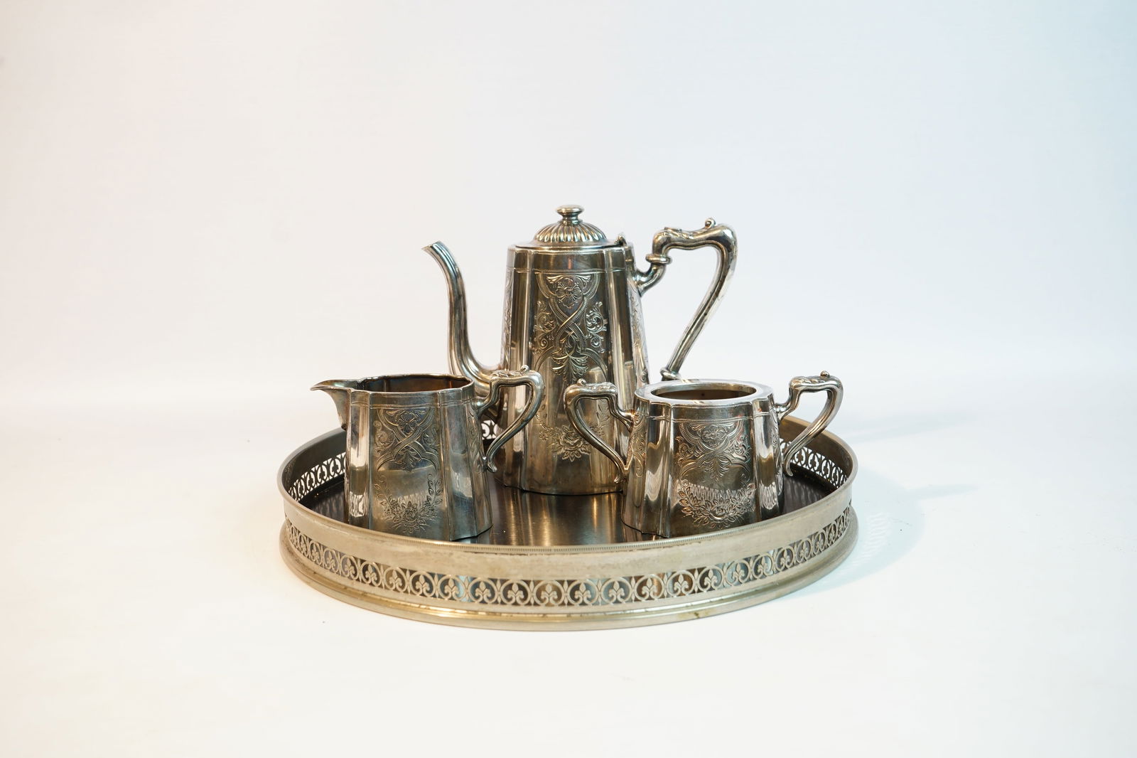 Silver-Plated Tea Set with Tray,20th c: Approximate size:teapot H:6.5in,tray diam:12in Shipping: We offer in-house shipping services for most small items. This means that we will take care of packing and shipping the items directly to you.