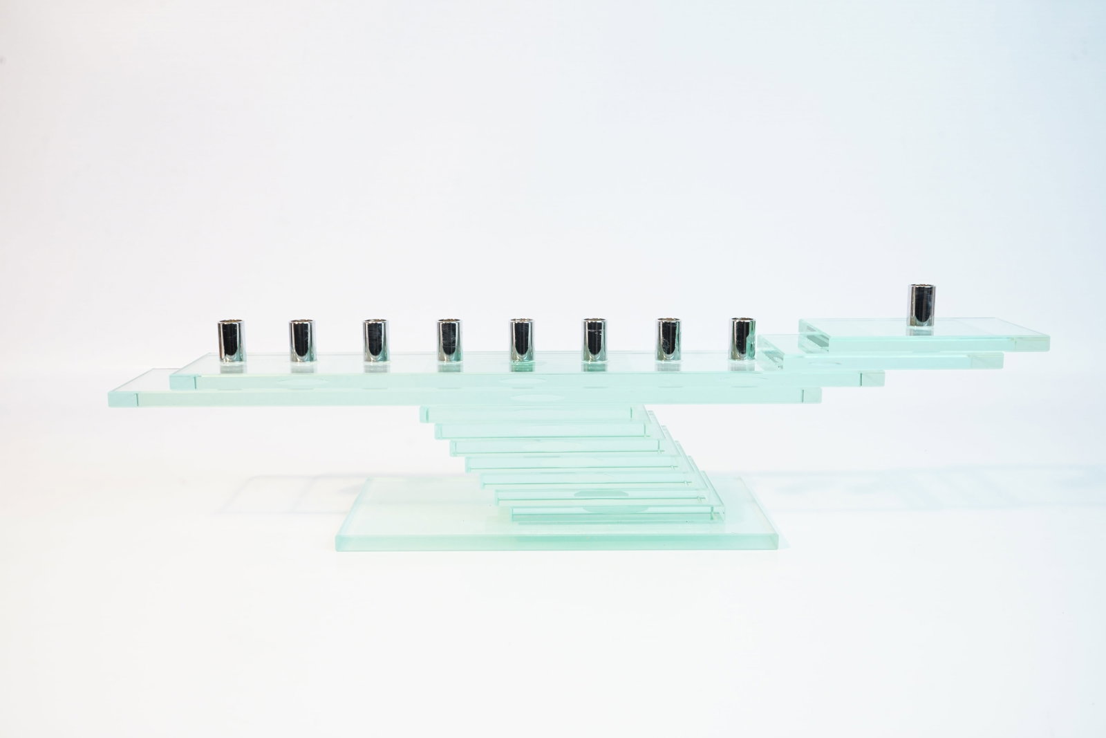 Modernist Stacked Glass 9 Candle Menorah: Approximate size:4.5x17.25x4in Shipping: We offer in-house shipping services for most small items. This means that we will take care of packing and shipping the items directly to you. For larger or sp
