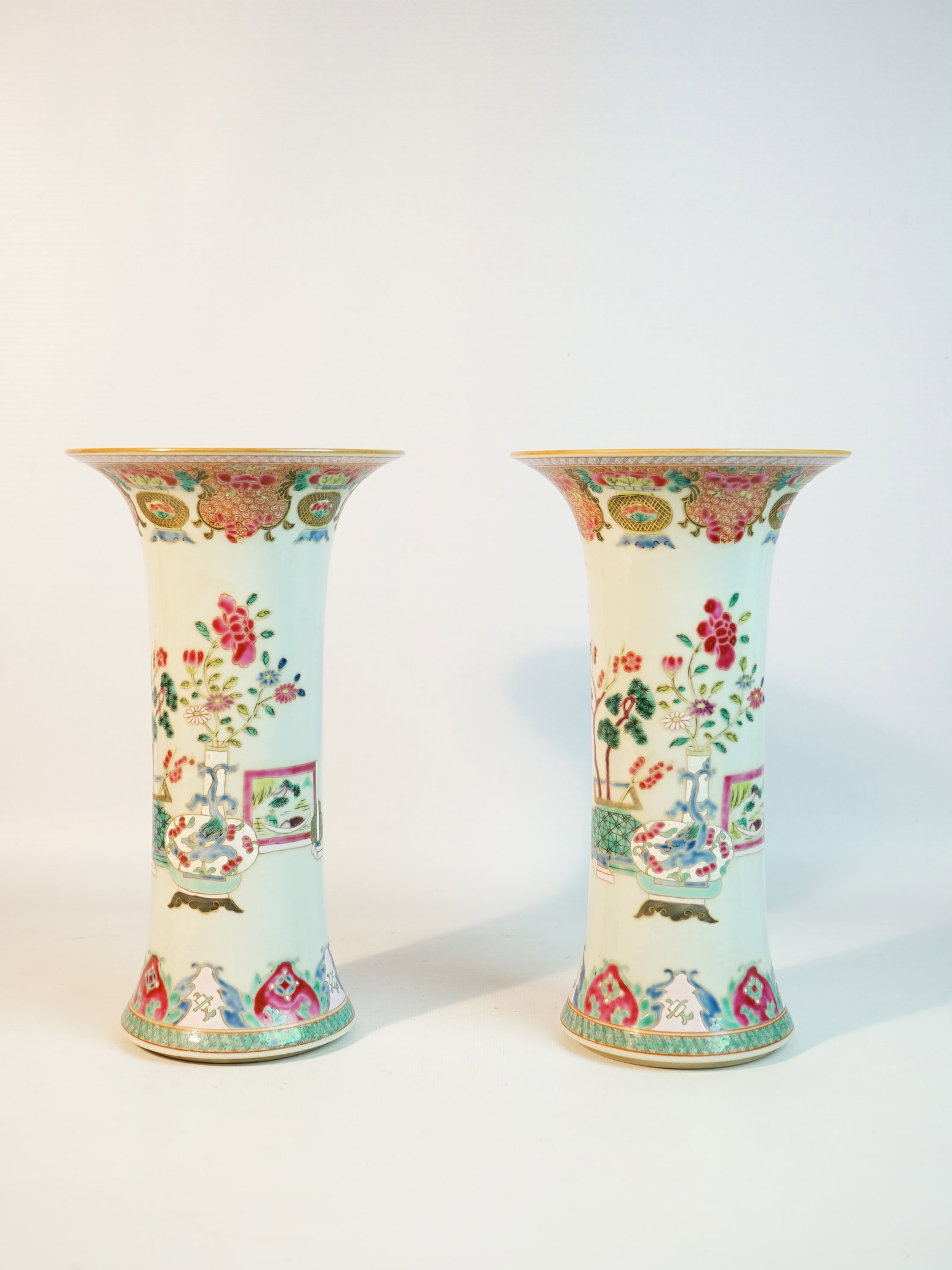 A Pair of Famille-Rose Beaker Vases,Qing Dynasty: Approximate size: Height: 10in Shipping: We offer in-house shipping services for most small items. This means that we will take care of packing and shipping the items directly to you. For larger or sp