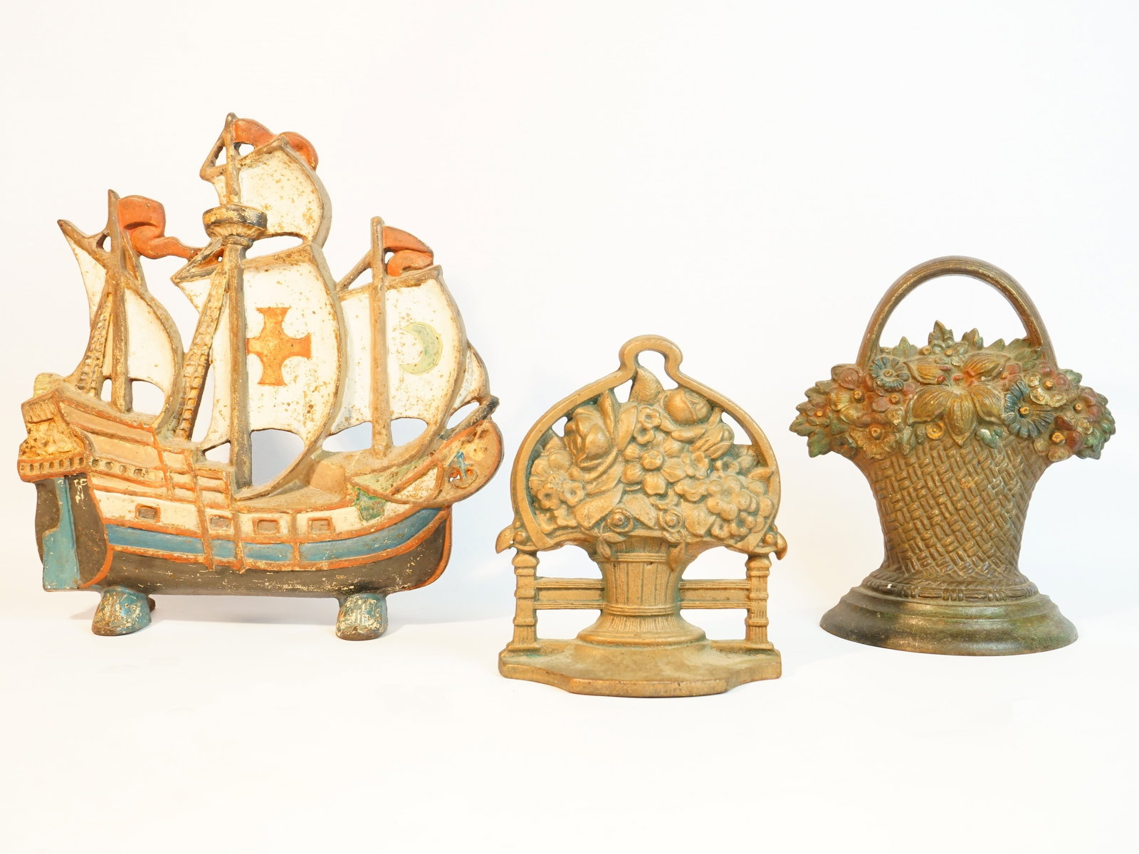 3 Vintage Cast Iron Door Stops: Approximate size:H:11 in/6.75in/8.5in Shipping: We offer in-house shipping services for most small items. This means that we will take care of packing and shipping the items directly to you. For large