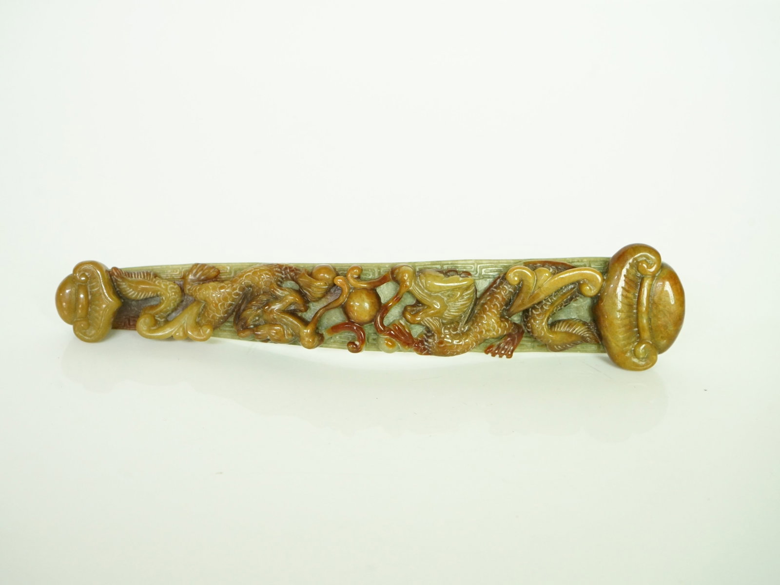 Chinese Carved Jade Belt Buckle: Approximate size: 6.5x1.5x0.5 in Shipping: We offer in-house shipping services for most small items. This means that we will take care of packing and shipping the items directly to you. For larger or 