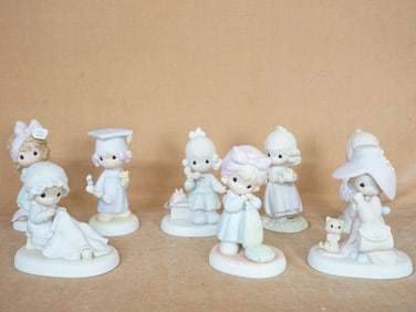 Lot of  8 Precious Moments Figurines