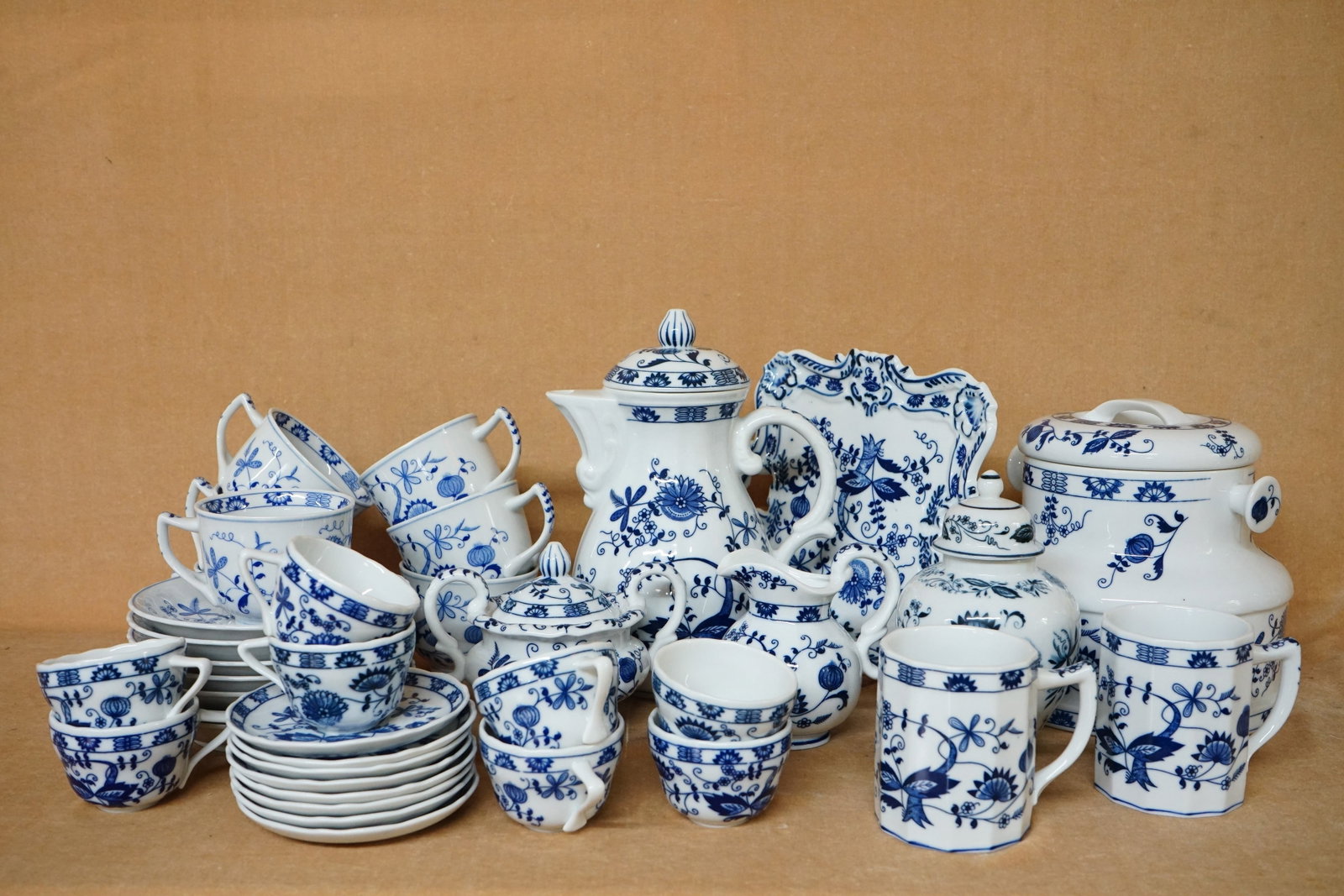 Lot of 38 Pieces Meissen Blue onion Style Porcelain Ware: Approximate size: in Shipping: We offer in-house shipping services for most small items. This means that we will take care of packing and shipping the items directly to you. For larger or specialized 