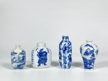 Four Blue and White Snuff Bottles