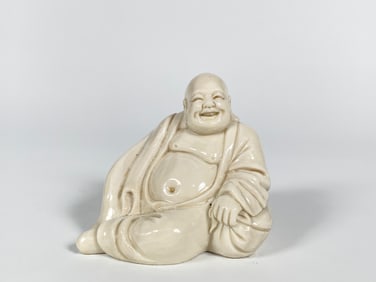 A Blanc-De-Chine Figure of Budha
