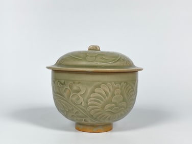 A Rare Yaozhou Carved Celadon Bowl and Cover