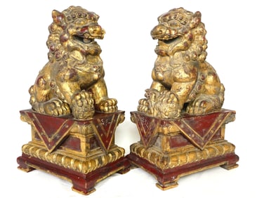 Pair of Large Chinese Gilt Carved Wood Foo Dogs