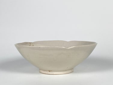A Small Lobed Ivory Glazed Bowl