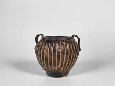A Black-Glazed Ribbed Jar