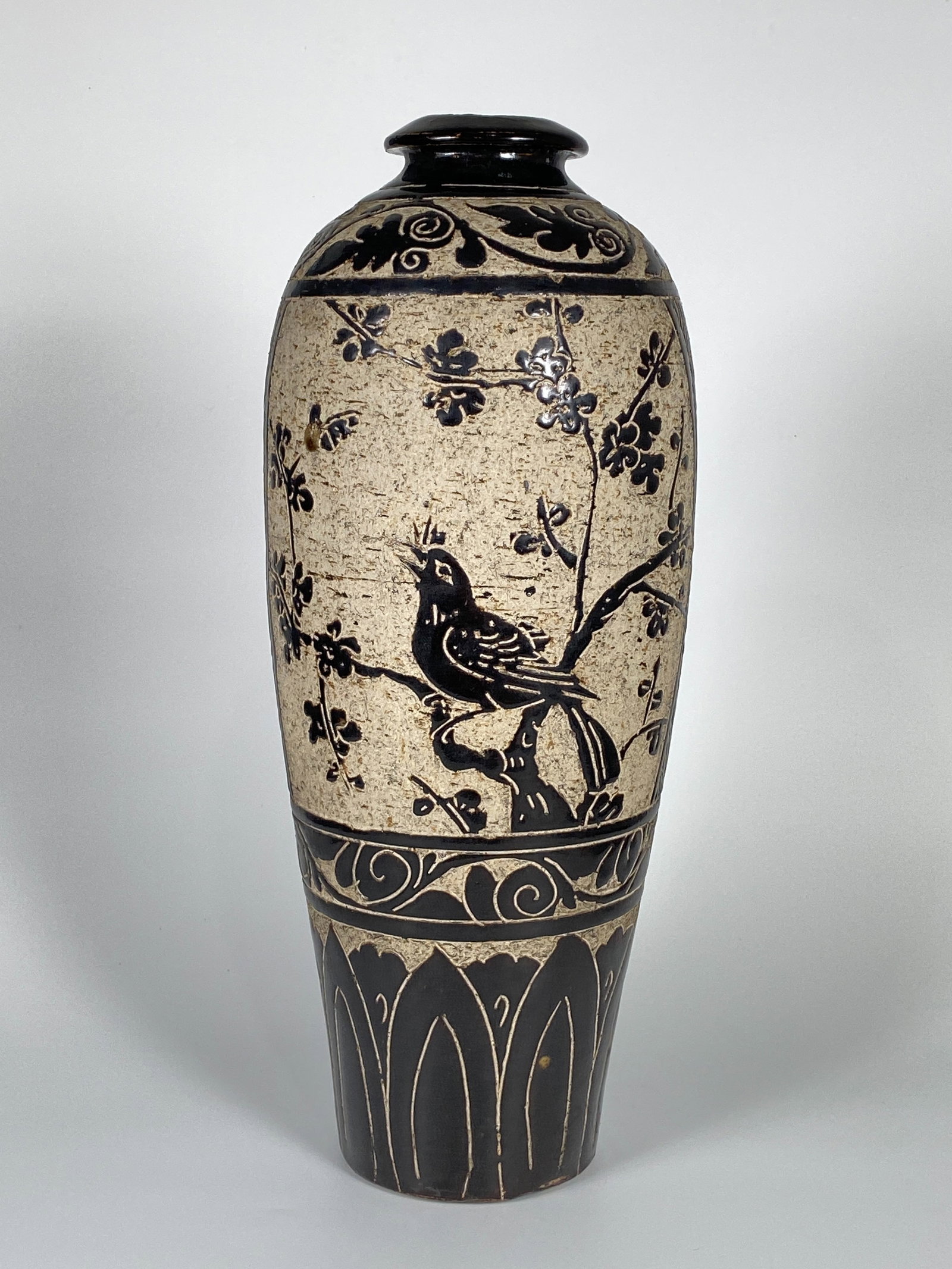 A Brown-Glazed Sgraffiato 'Floral' Vase: Approximate size: H: 15.75 in Shipping: We offer in-house shipping services for most small items. This means that we will take care of packing and shipping the items directly to you. For larger or spe