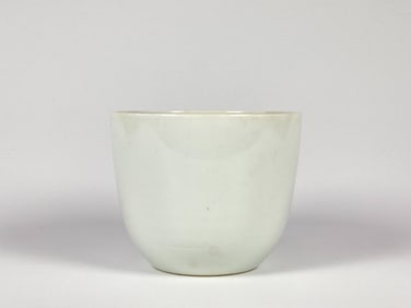 A Chinese White-Glazed Cup With Stuio Marks