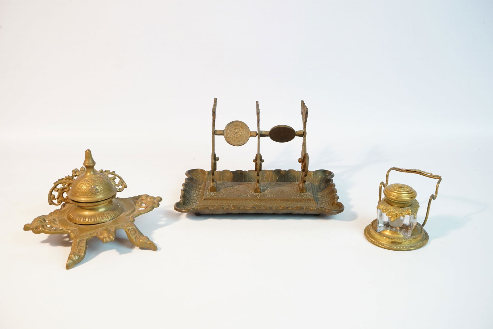 2 Brass Inkwells and An Inkwell Base,19th C: Approximate size:5x8.5x5.5in Shipping: We offer in-house shipping services for most small items. This means that we will take care of packing and shipping the items directly to you. For larger or spec