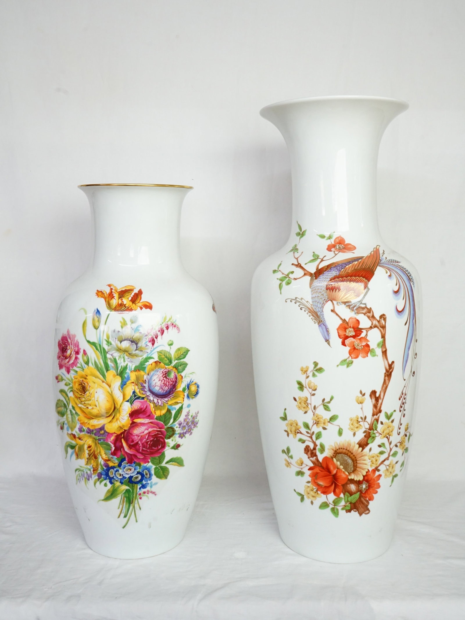 Lot of 2 1960s German Ak Kaiser Mottahedeh Porcelain Vases: Approximate size: H:26.5 in/22.5 in Shipping: We offer in-house shipping services for most small items. This means that we will take care of packing and shipping the items directly to you. For larger 