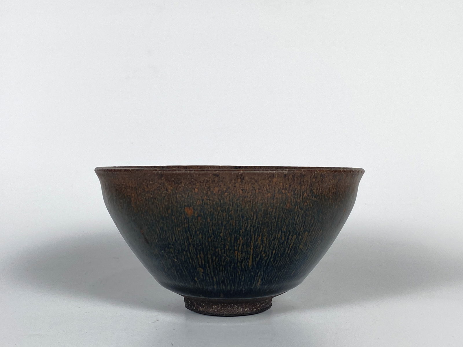 Chinese Jian Russet-Streaked 'Hare's Fur' Tea Bowl: Approximate Size: 2.75x5 in Shipping: We offer in-house shipping services for most small items. This means that we will take care of packing and shipping the items directly to you. For larger or speci