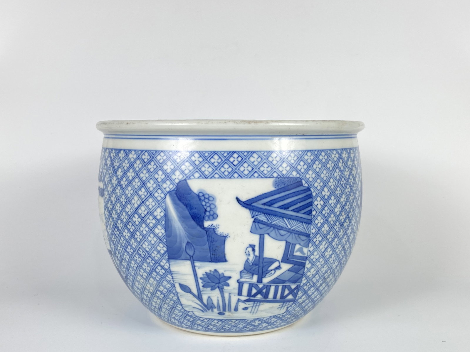 A Blue and White 'Figure' Jardinière, Kangxi Mark: Approximate size:6.75x9 in(HxD) Shipping: We offer in-house shipping services for most small items. This means that we will take care of packing and shipping the items directly to you. For larger or s