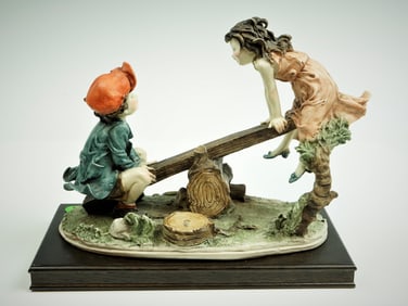 Italian Giuseppe. Armani Boy & Girl on Seesaw 1978 Sculpture