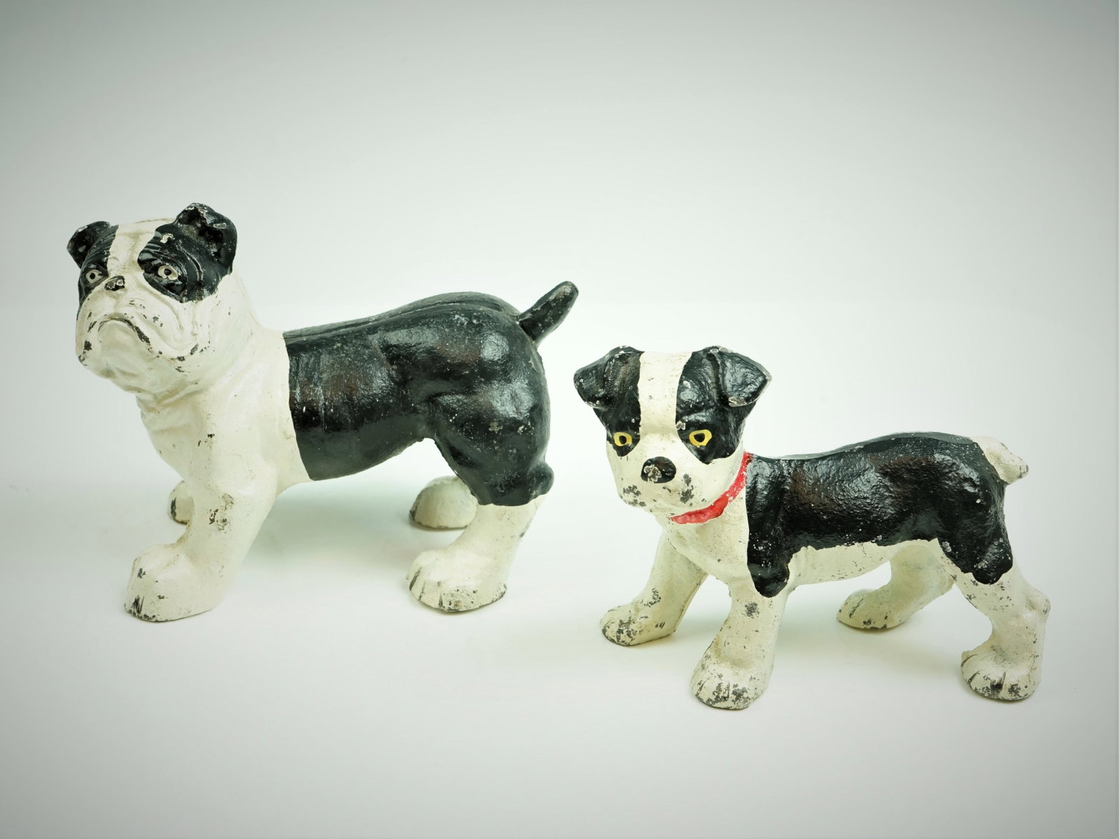 Lot of Antique Hubley USA English Bulldog Cast Iron Sculptures: Approximate Size: Height:5 1/2in 4 1/2in Length:6 3/4in 5 1/2in Shipping: We offer in-house shipping services for most small items. This means that we will take care of packing and shipping the items 