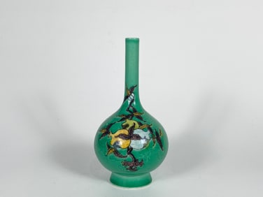 Rare Aubergine and -Yellow Enamelled Green-Ground Bottle Vase