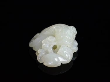 A White Jade Carving of 'Mythical Beast'Group