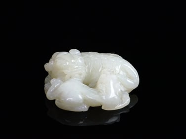 A Fine and Rare White Jade 'Buddhist Lions'