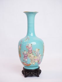 Chinese Turquoise Ground Famille Rose'Hundreds Playing Boys' Vase with Wood Base