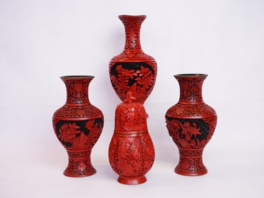 Group of Four Chinese Cinnabar Vases
