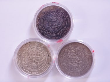 Lot of 3 Chinese Dollar Coins
