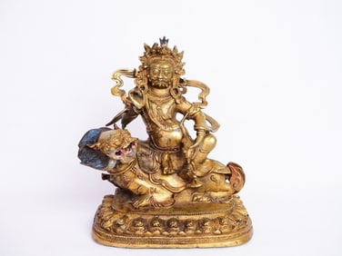 A Gilt in Bronze VAISHRAVANA Statue