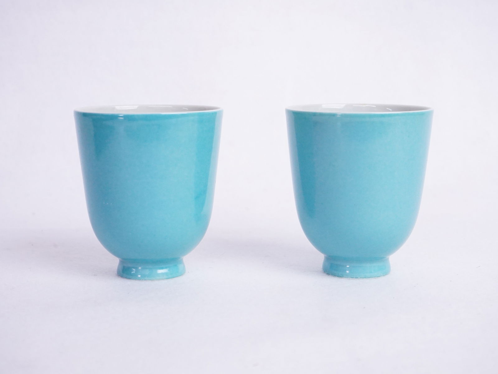 Pair of Chinese Turquoise Glazed Cups with Mark: Approximate size: 2.5x1.25x1.25 in Shipping: We offer in-house shipping services for most small items. This means that we will take care of packing and shipping the items directly to you. For larger o