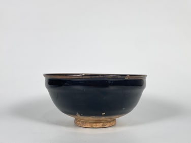 A Black-Glazed and Russet-Splashed Bowl