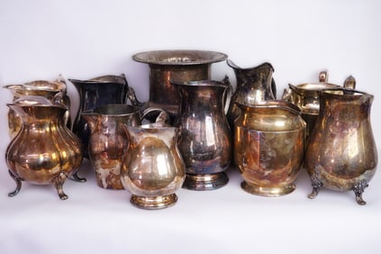 Group of 11 Sliver Plated Vessels,10 Pitchers and 1 Ice Bucket