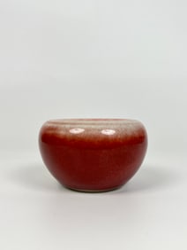 A Chinese Monochrome Sang De Boeuf Alms Bowl