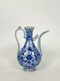 A Chinese Blue And White Ewer