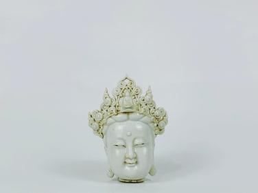 A Chinese White Glazed Kwan-Yin Head