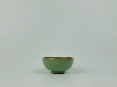 A Molded 'Longquan' Celadon-Glazed Bowl
