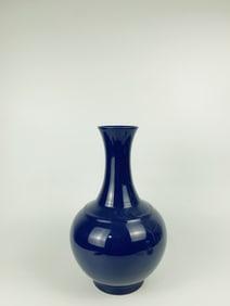 A Chinese Monochrome Blue-Glazed Bottle-Shaped Vase