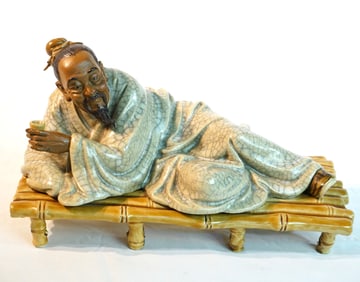A Chinese Shiwan Pottery Figure