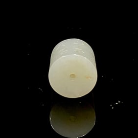 A Chinese Inscribed and Carved Hetian Jade Bead