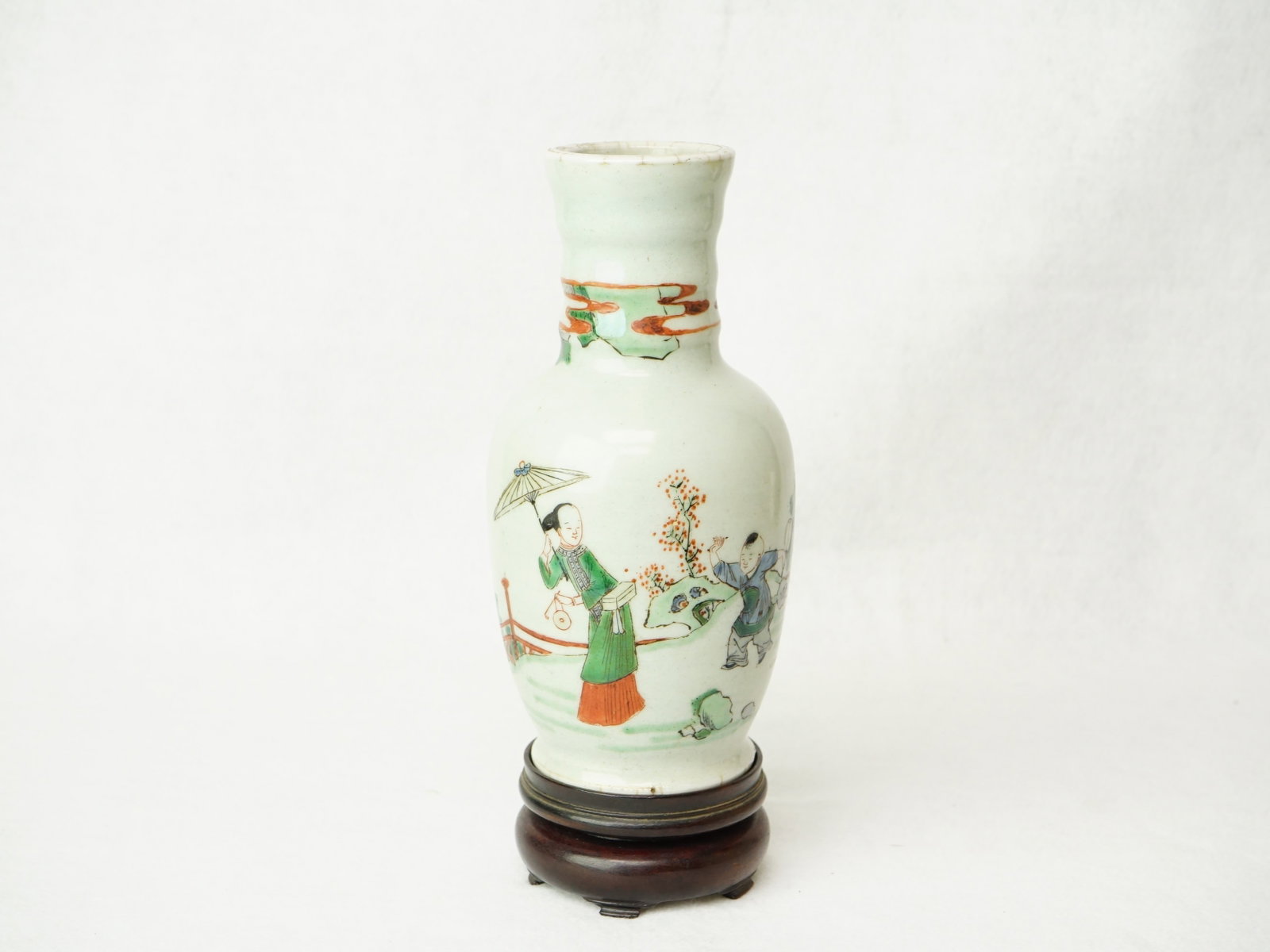 A Chinese Wucai 'Lady' Vase with Wood Stand, Qing Dynasty, Kangxi Period: Approximate size: H: 8 in Shipping: We offer in-house shipping services for most small items. This means that we will take care of packing and shipping the items directly to you. For larger or special