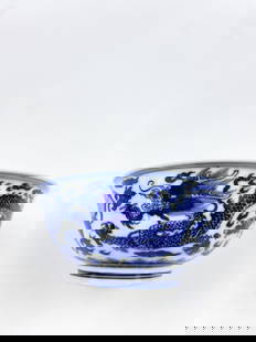 A Chinese Blue and White 'Dragon' Bowl with Mark: Approximate size: 2 3/8x5 1/4 in (HxDia) Shipping: We offer in-house shipping services for most small items. This means that we will take care of packing and shipping the items directly to you. For la