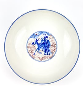 A Chinese Copper-Red-Decorated Blue and White 'Eight Immortals' Bowl, Qing Dynasty