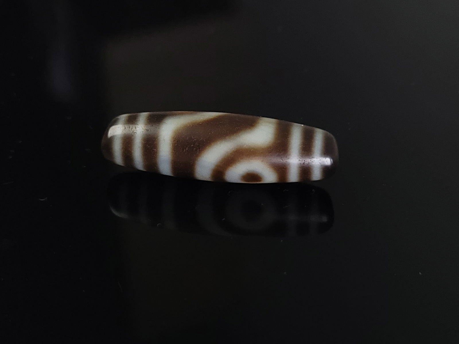 A Tibetan Dzi Bead (1 of 4)