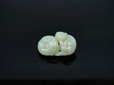 Chinese Carved Pale Celadon Jade 'Double Badger' Group