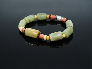 A Chinese Jade Beaded Bracelet
