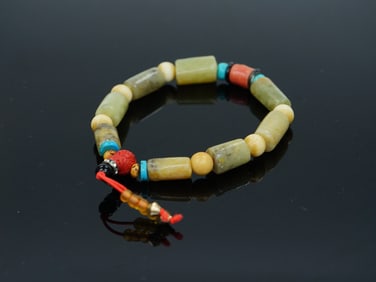 A Chinese Jade Beaded Bracelet