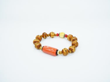 A Chinese Coral and Wood Beaded Bracelet