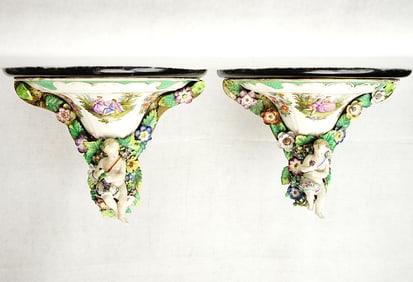Two German Handpainted Dresden Wall Bracket/Shelves with Decorative Polychrome Porcelain Cherub
