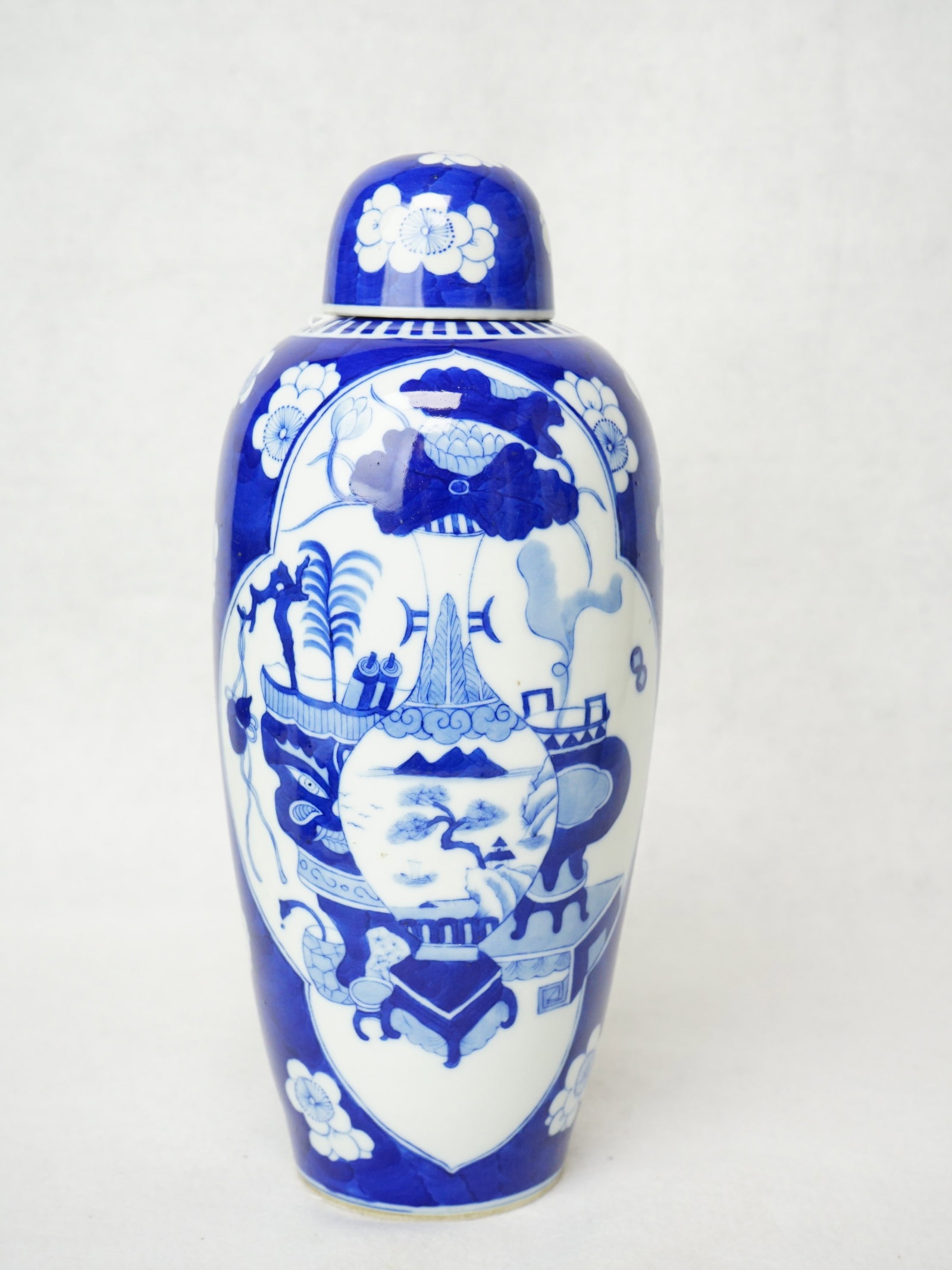 A Chinese Blue And White Covered Vase: Approximate size:H:9.5 in Shipping: We offer in-house shipping services for most small items. This means that we will take care of packing and shipping the items directly to you. For larger or special