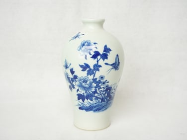 A Chinese Blue And White 'Flower And Butterfly' Vase